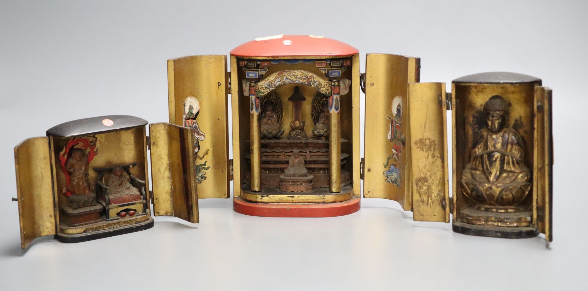 Three Japanese lacquer portable shrines (zushi), 19th century, tallest 15cm